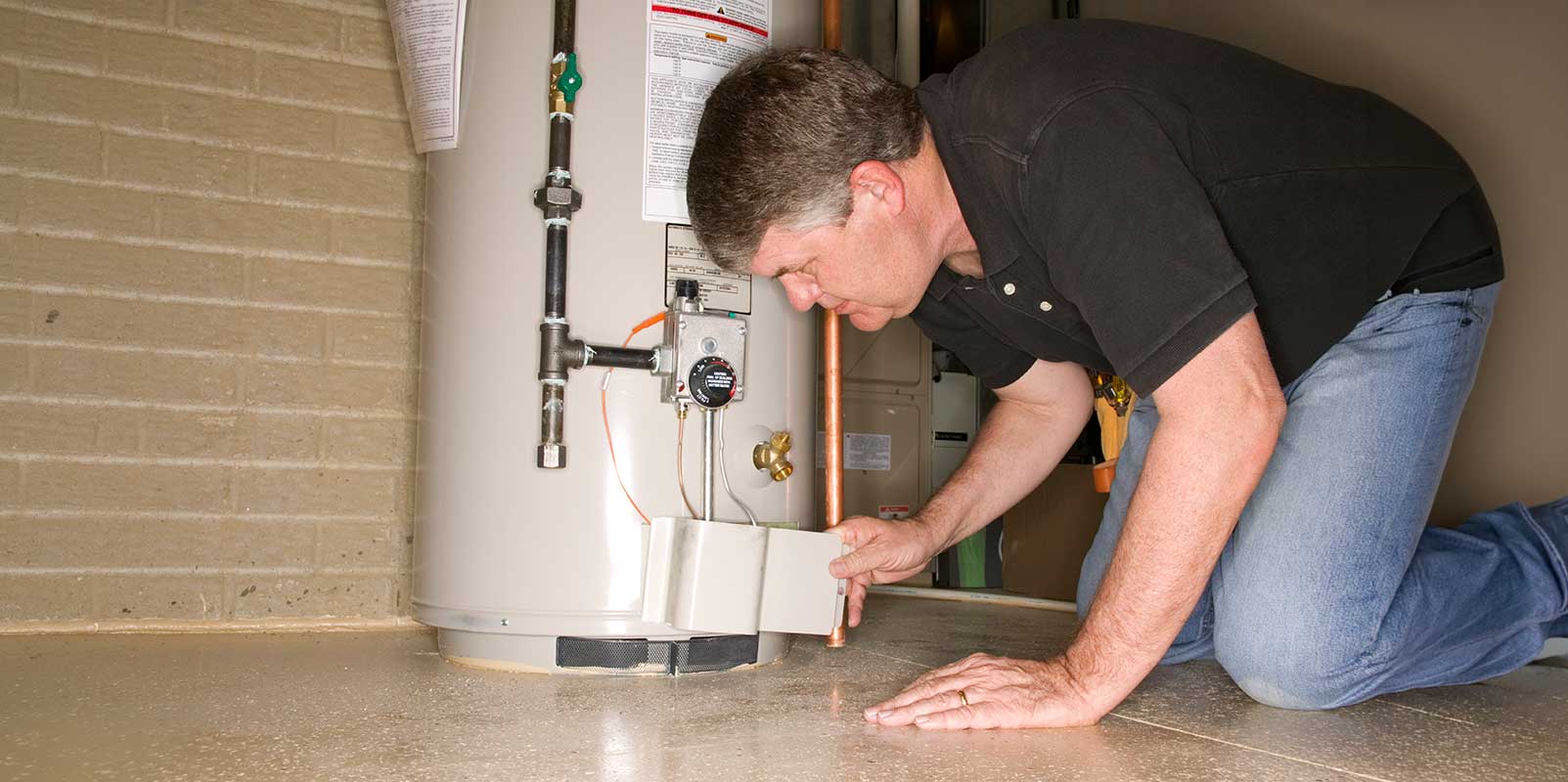 inspecting-water-heater